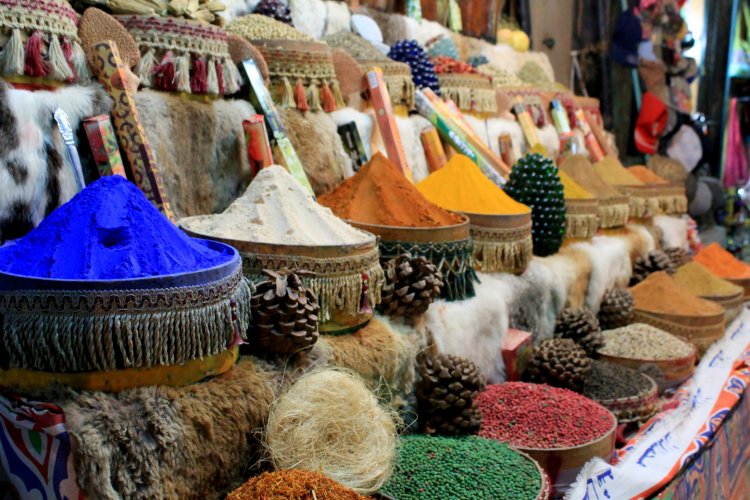 Colorful traditional market souk in El Quseir with spices and textiles